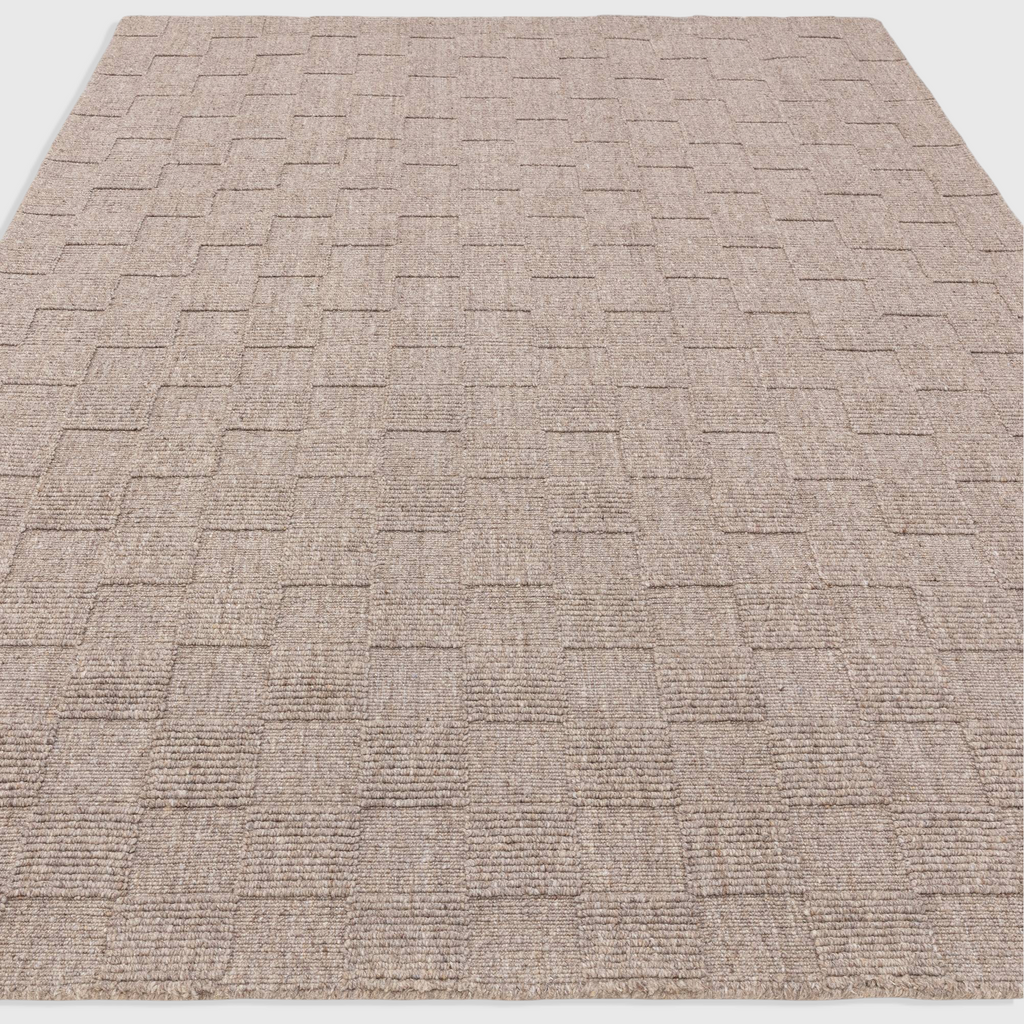Alvo Rugs Mercia natural wool rug with a textured hand-woven loop pile in a neutral beige tone