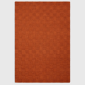 Alvo Rugs Mercia rust orange hand woven wool rug with a textured square loop pile pattern