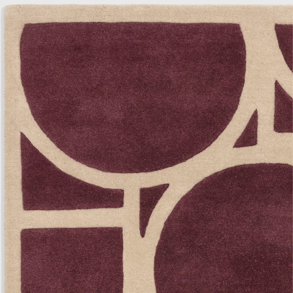 Alvo Rugs Metra Plum rug featuring a hand-tufted 100% wool geometric pattern in deep purple and beige tones.