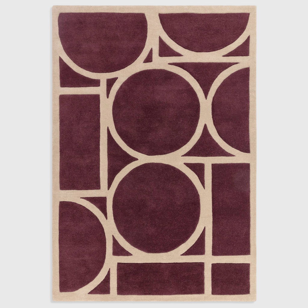 Alvo Rugs Metra Plum rug featuring a hand-tufted geometric pattern in deep purple and beige 100% wool high-low pile.