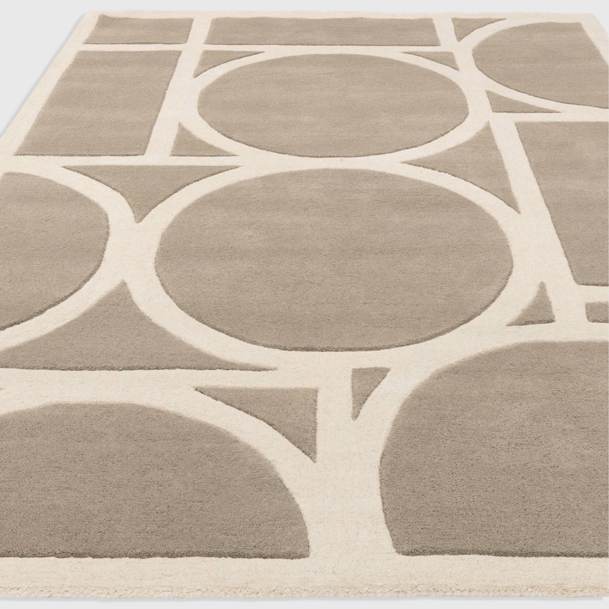 Alvo Rugs Metra taupe and beige wool rug with a modern geometric circle pattern and high-low pile texture.