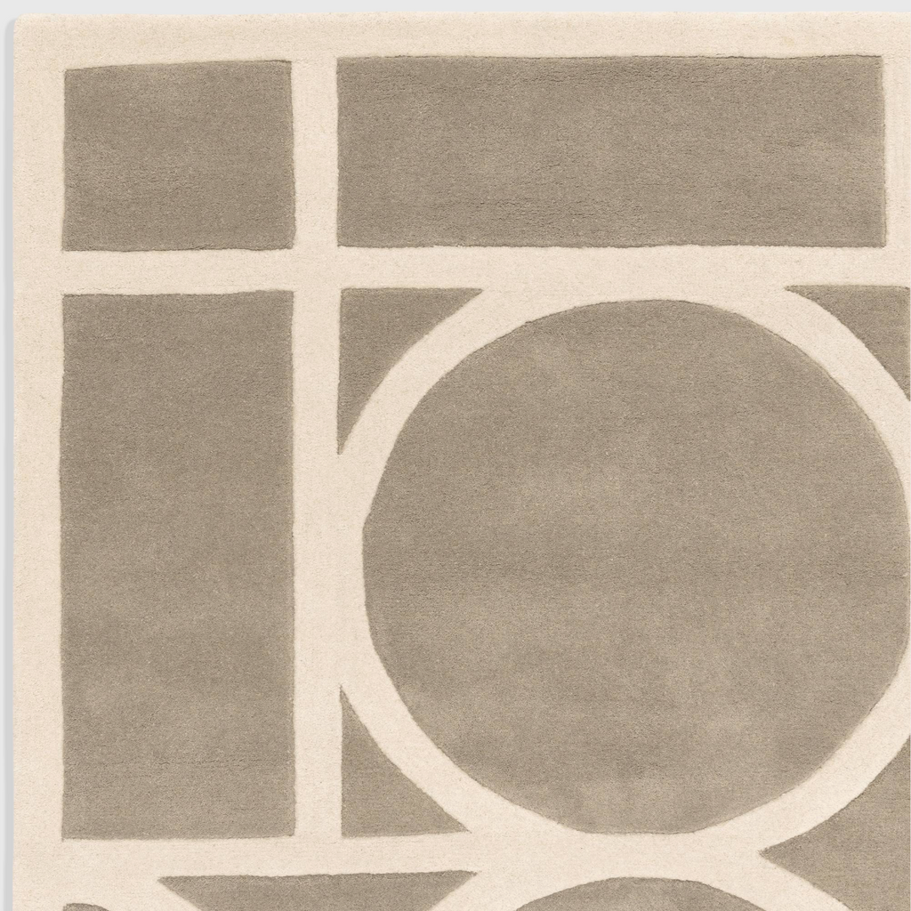 Alvo Rugs Metra taupe wool rug featuring a hand-tufted geometric pattern with a high-low pile texture.