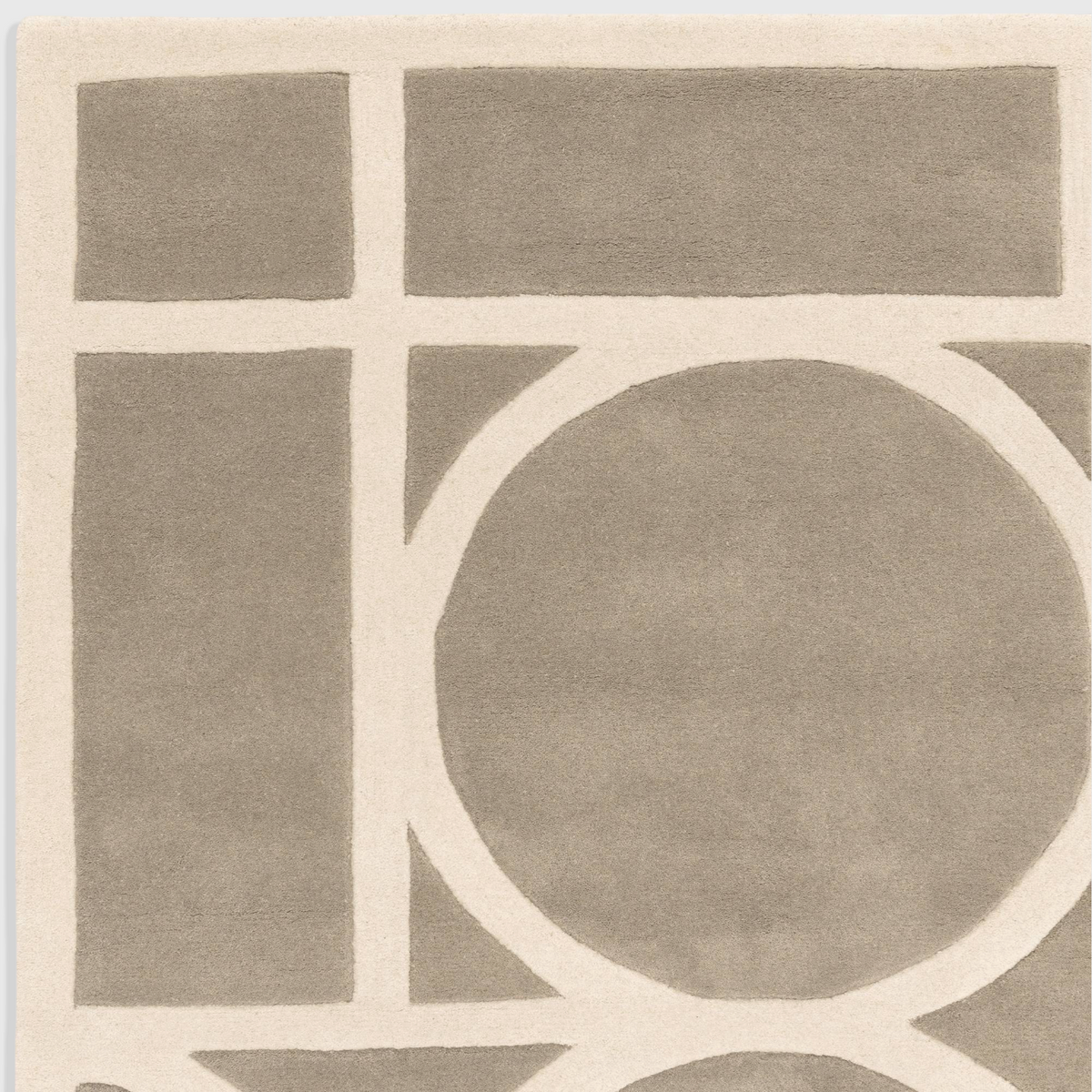 Alvo Rugs Metra taupe wool rug featuring a hand-tufted geometric pattern with a high-low pile texture.