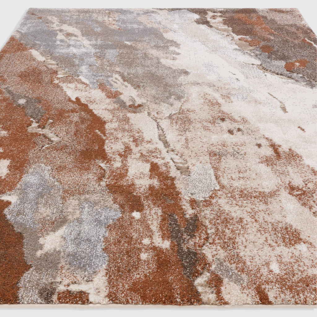 Alvo Rugs Miraga Blur Terra rug featuring an abstract orange and grey pattern with a textured high-low shaggy pile.