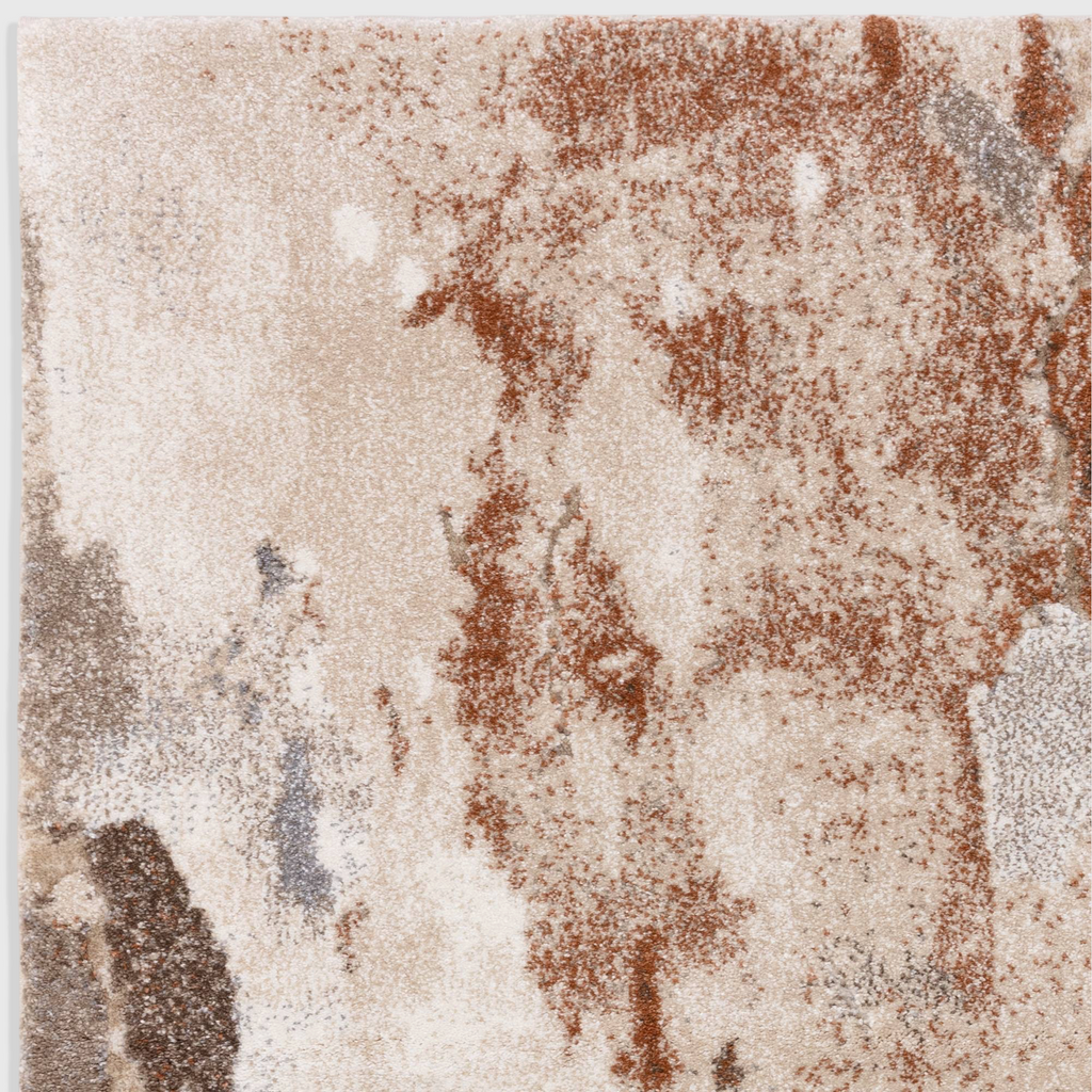 Alvo Rugs Miraga Blur Terra rug featuring a shaggy high-low pile with abstract orange and beige textured patterns.