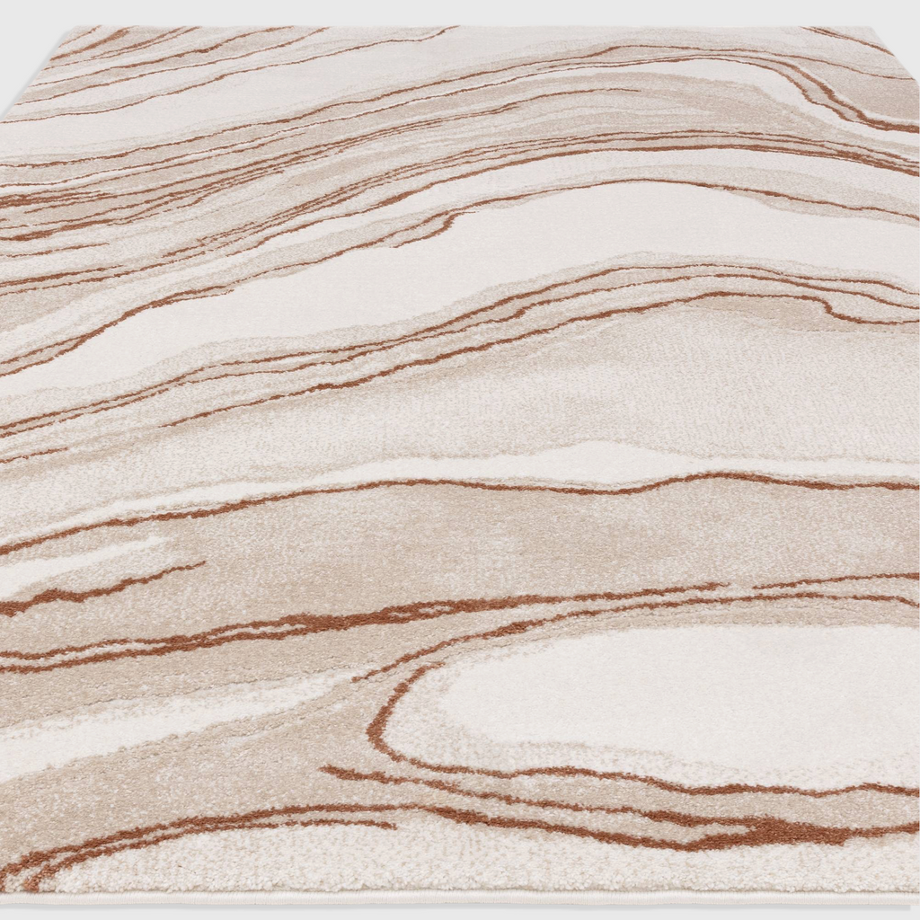 Alvo Rugs Miraga Quartz Terra rug with a high-low shaggy pile and abstract orange and cream marble-inspired patterns.