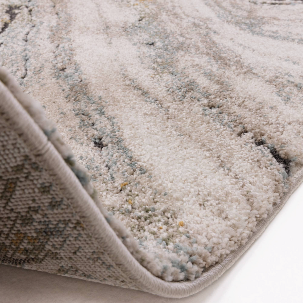 Alvo Rugs Miraga Wave blue shaggy rug corner view showing high-low pile texture and durable jute backing