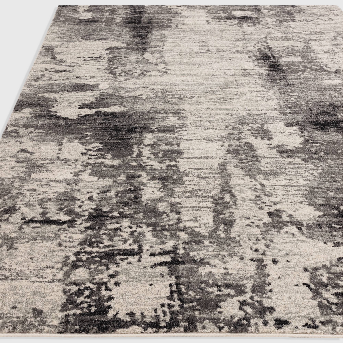 Alvo Rugs Novella Mirage Nv37 abstract area rug in grey and silver tones with a soft polypropylene cut pile finish.