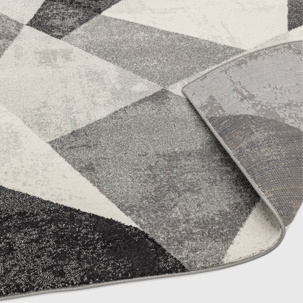 Alvo Rugs Novella Nv02 grey and silver geometric patterned polypropylene rug with a durable jute backing.
