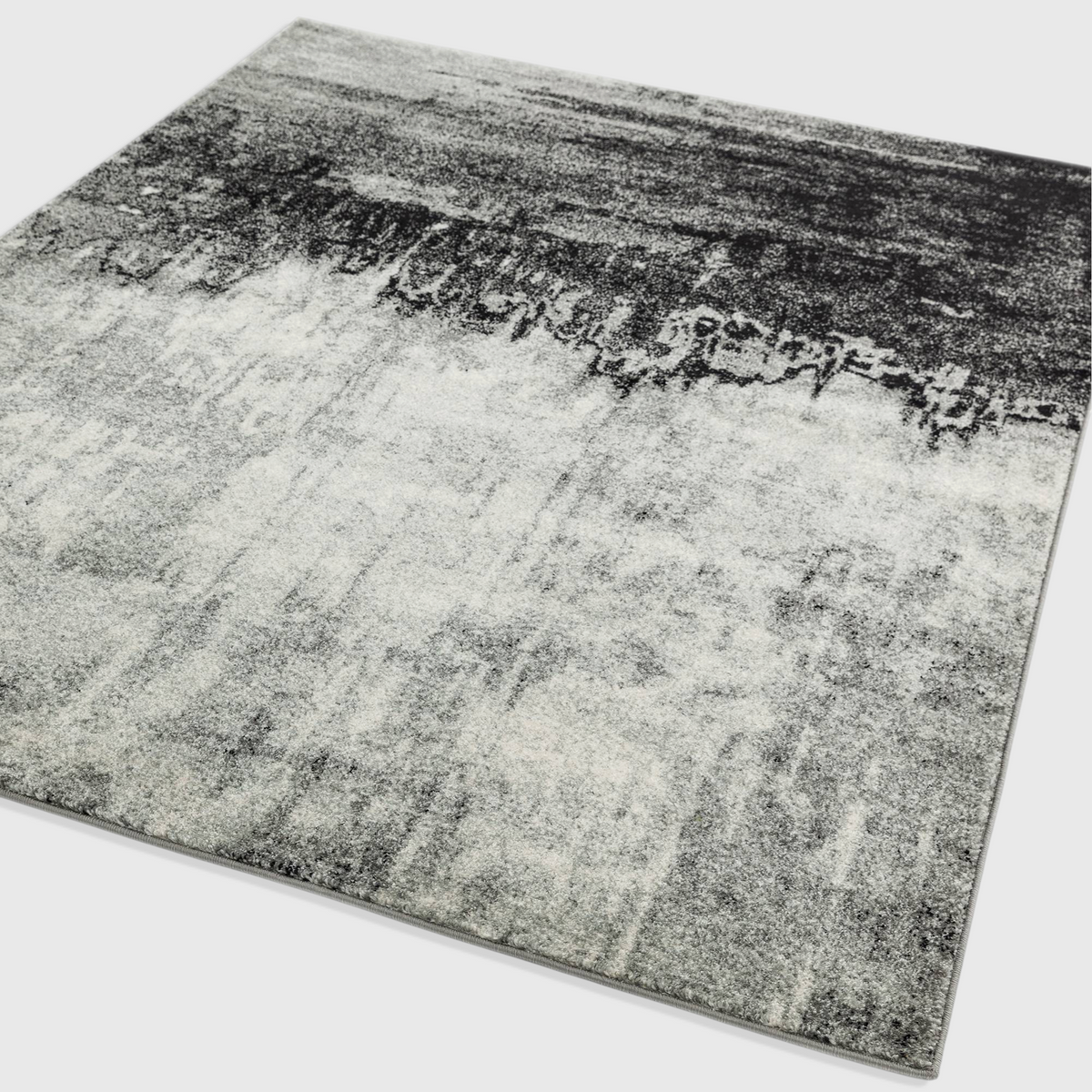 Alvo Rugs Novella Nv03 abstract area rug in distressed grey and silver tones with a soft polypropylene pile.