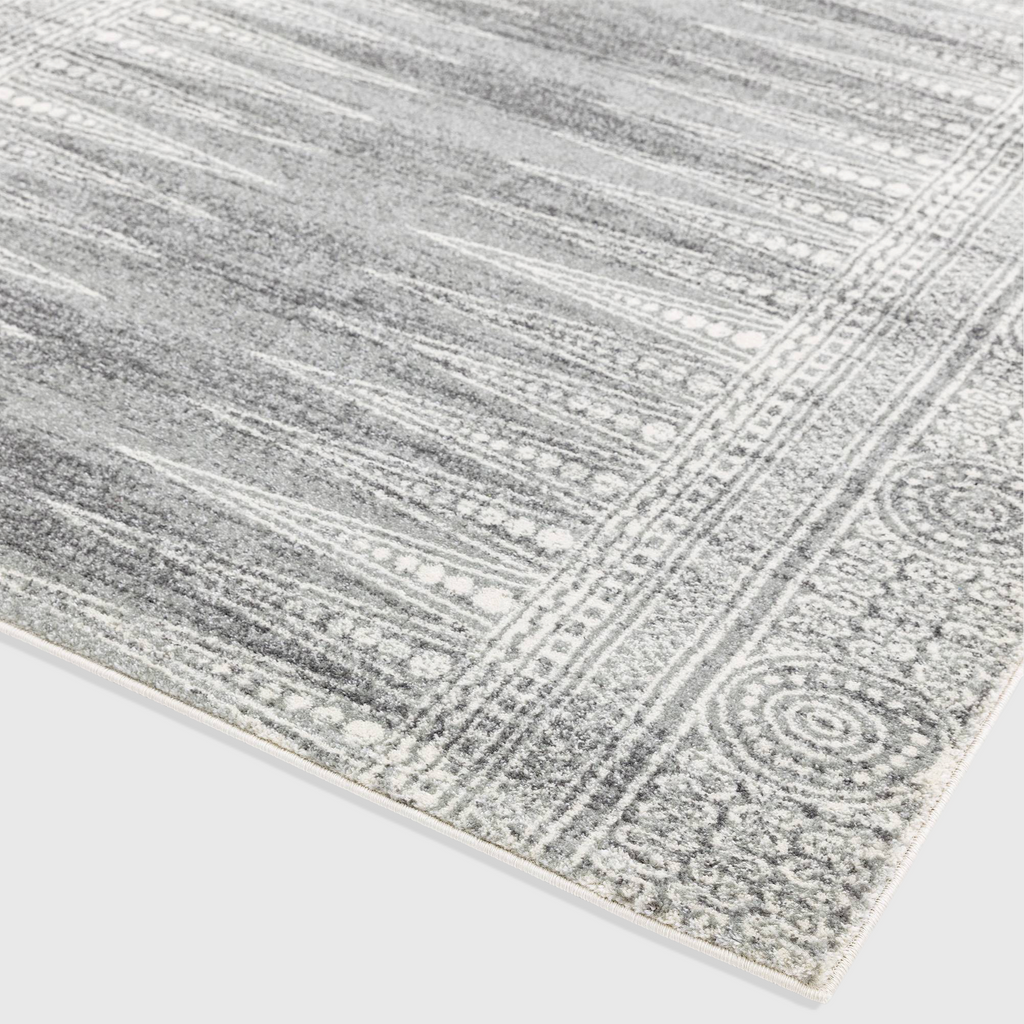 Alvo Rugs Novella Nv07 grey woven polypropylene rug with a detailed geometric border and soft cut pile texture