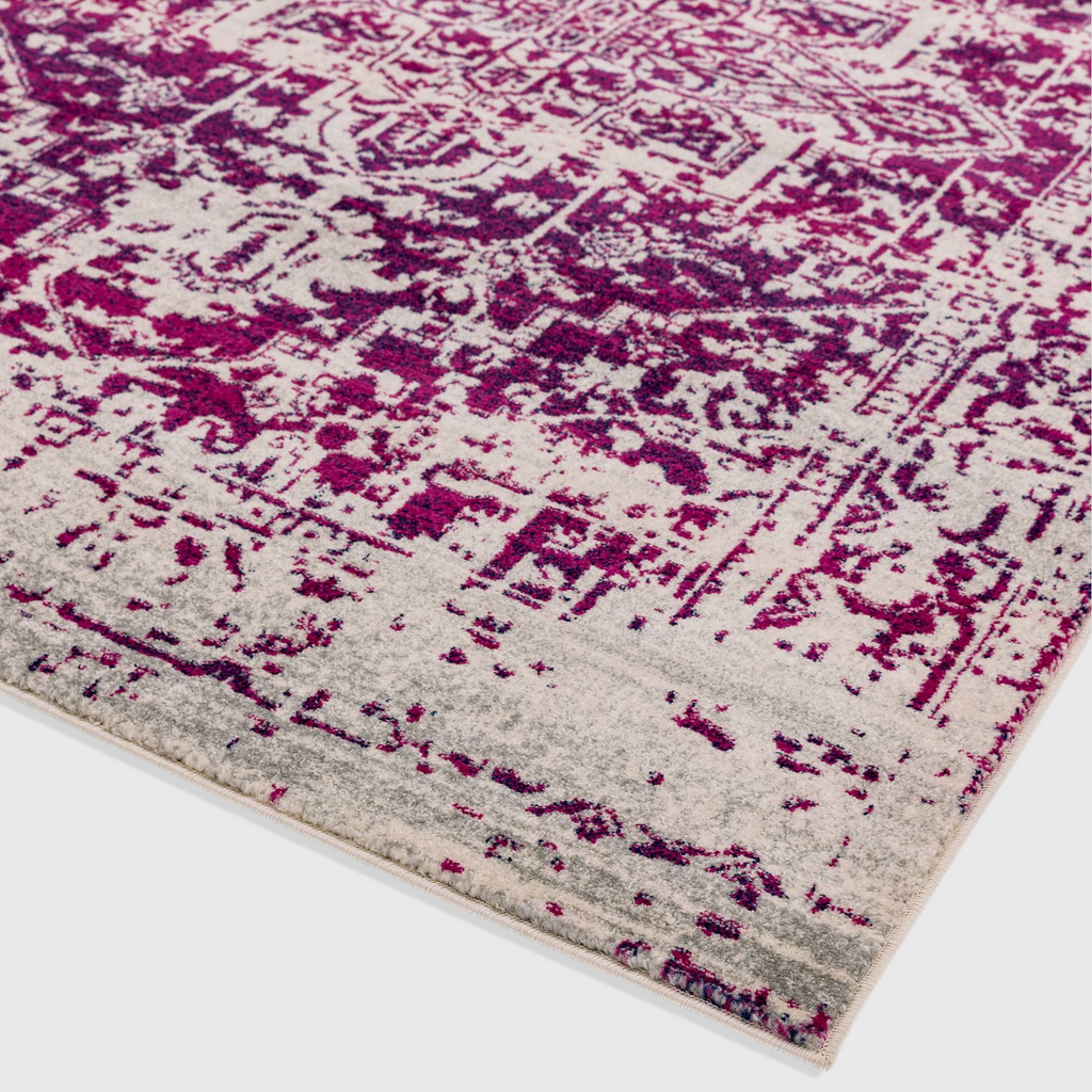 Alvo Rugs Novella Nv08 antique fuchsia rug with a distressed classic pattern and soft polypropylene pile.