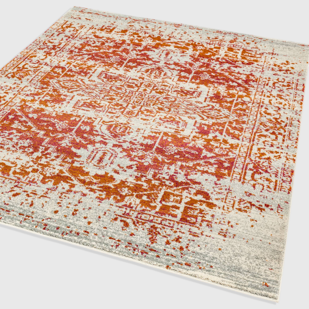 Alvo Rugs Novella Nv09 antique orange area rug with a distressed traditional pattern and soft polypropylene pile.