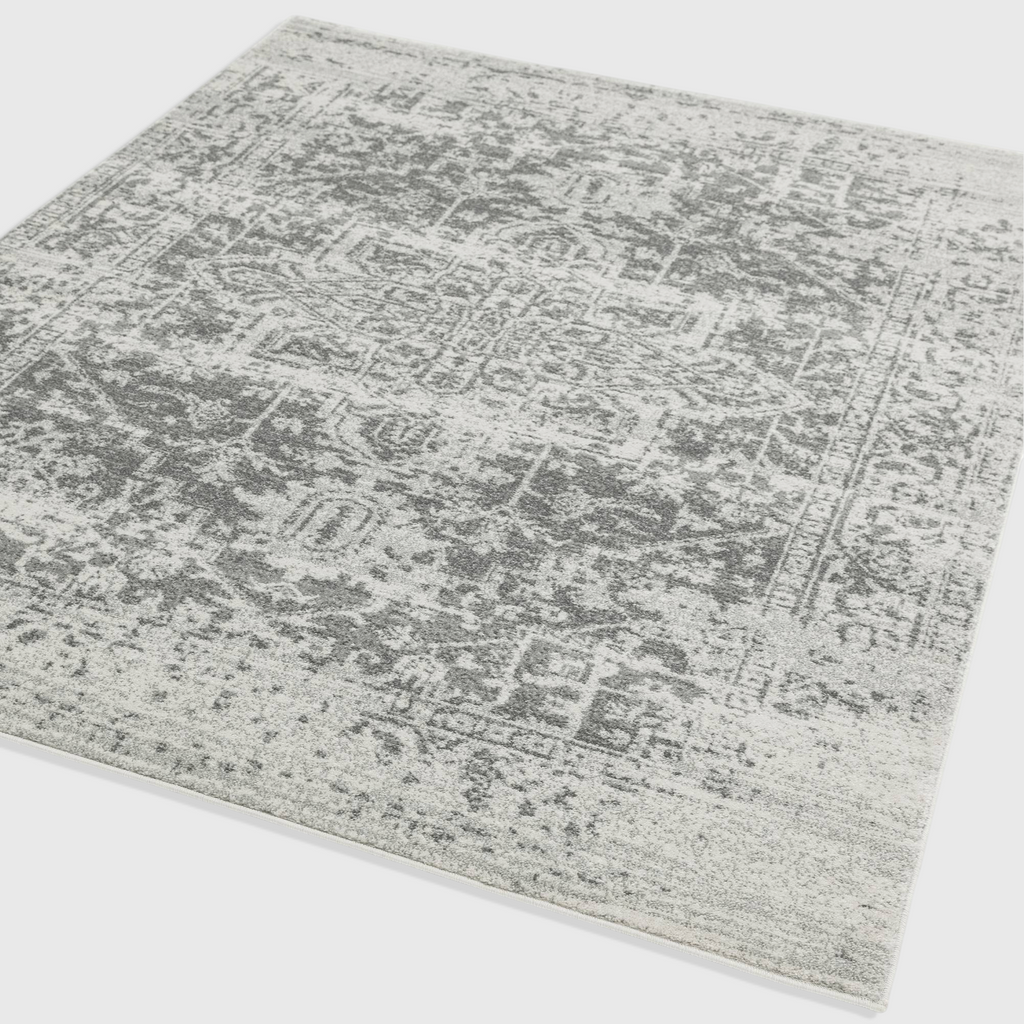 Alvo Rugs Novella Nv26 medallion rug in ivory and grey with a distressed traditional pattern and soft polypropylene pile