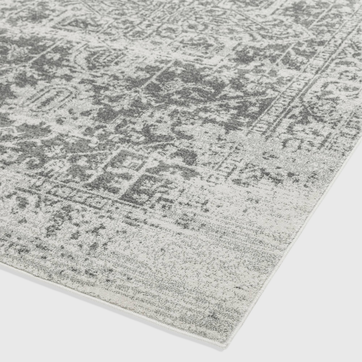 Alvo Rugs Novella antique grey polypropylene rug with a distressed classic pattern and soft cut pile texture