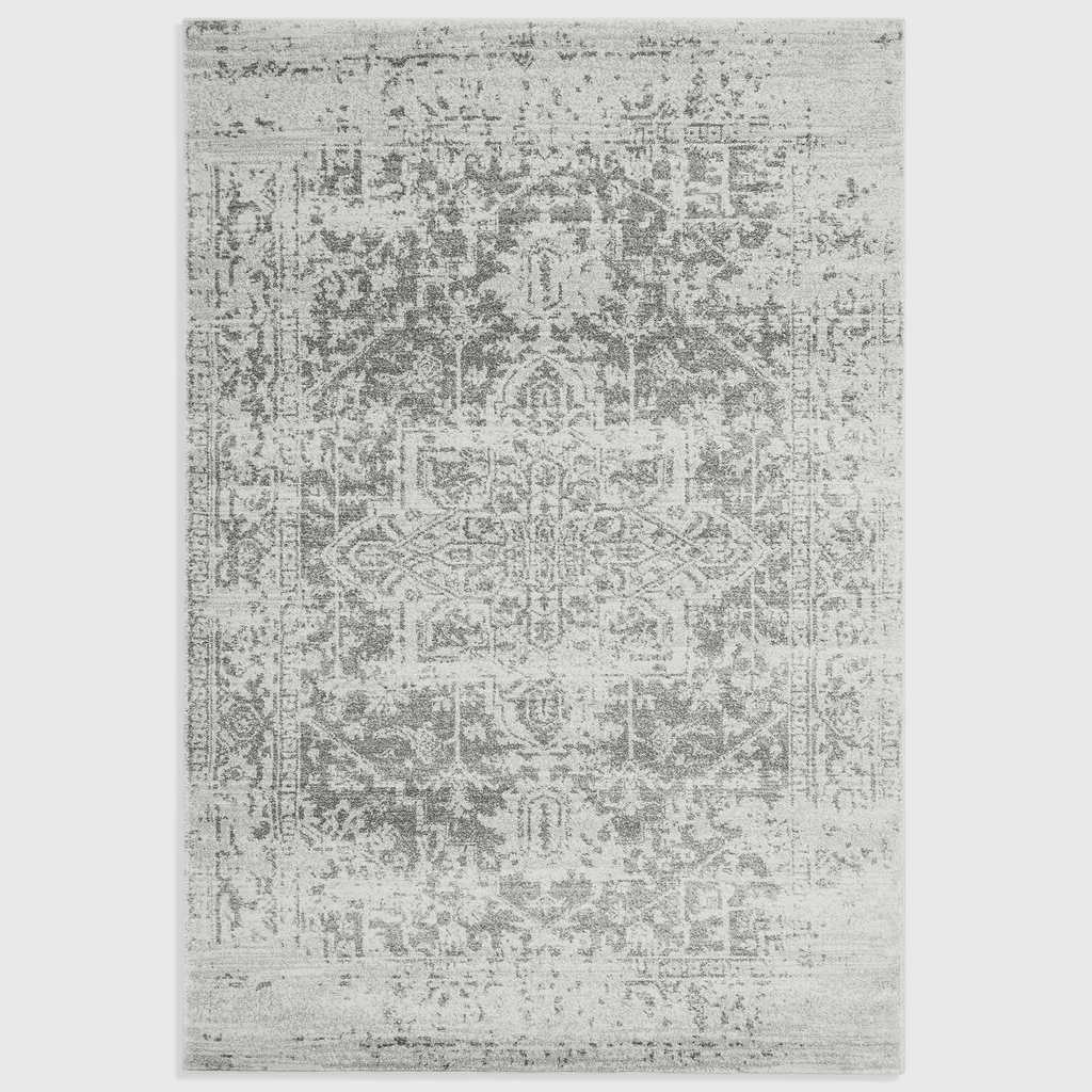 Alvo Rugs Novella antique grey area rug with a distressed traditional pattern and soft polypropylene pile.