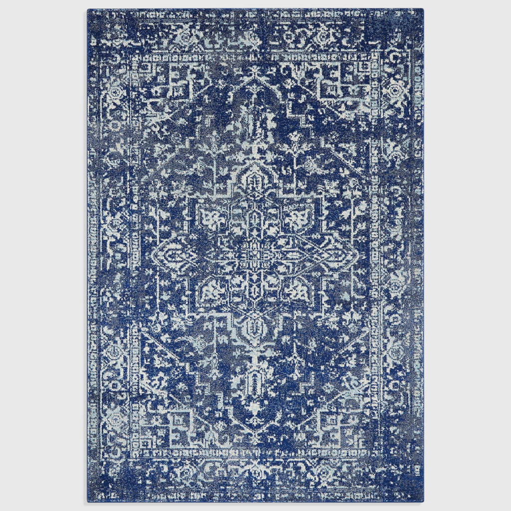 Alvo Rugs Novella antique navy blue area rug with a classic distressed medallion pattern and durable polypropylene pile