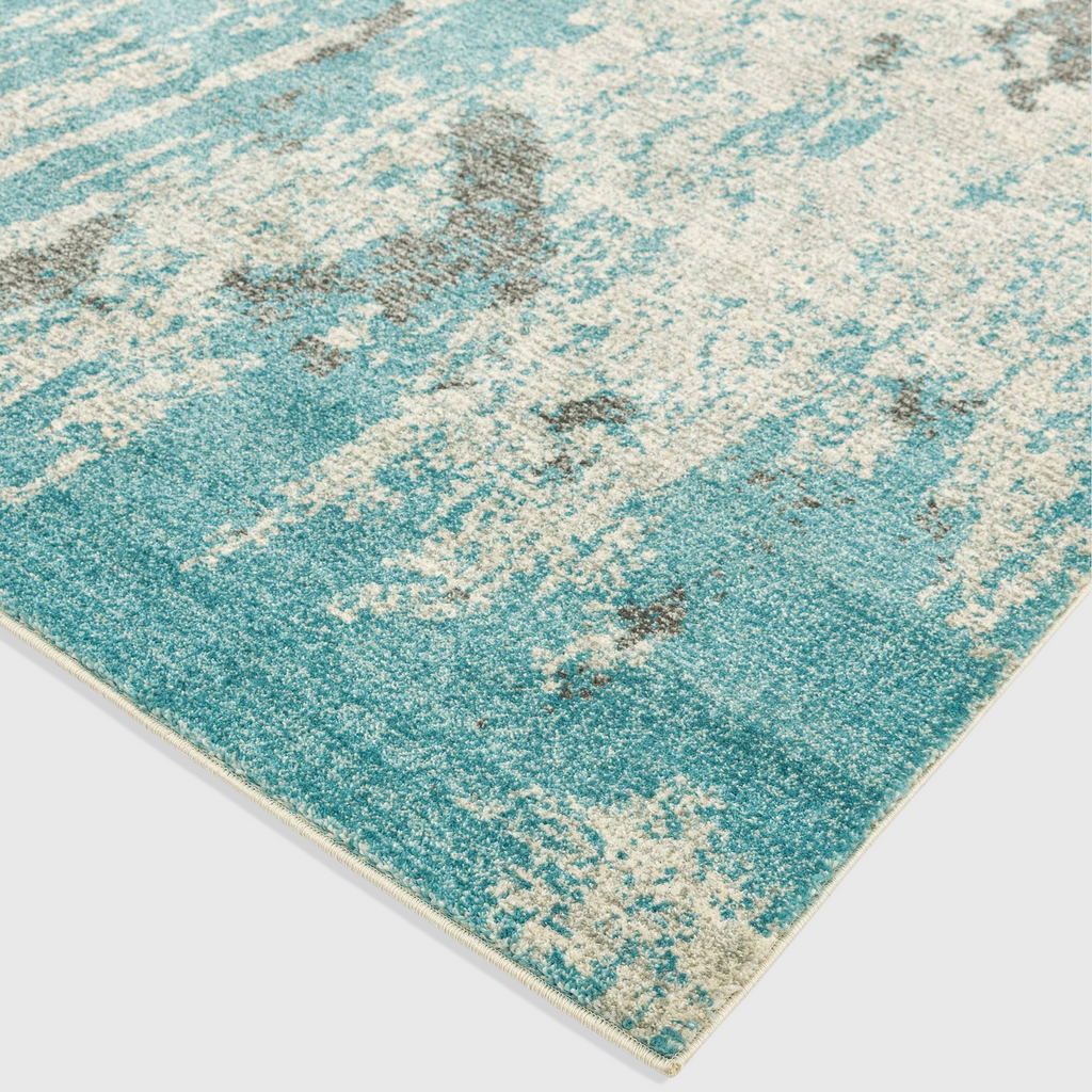 Alvo Rugs Novella Nv15 abstract painterly rug in duck egg blue and grey, machine woven from soft polypropylene.