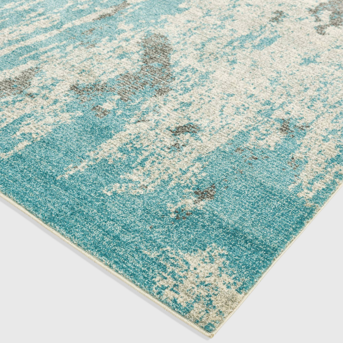 Alvo Rugs Novella Nv15 abstract painterly rug in duck egg blue and grey, machine woven from soft polypropylene.