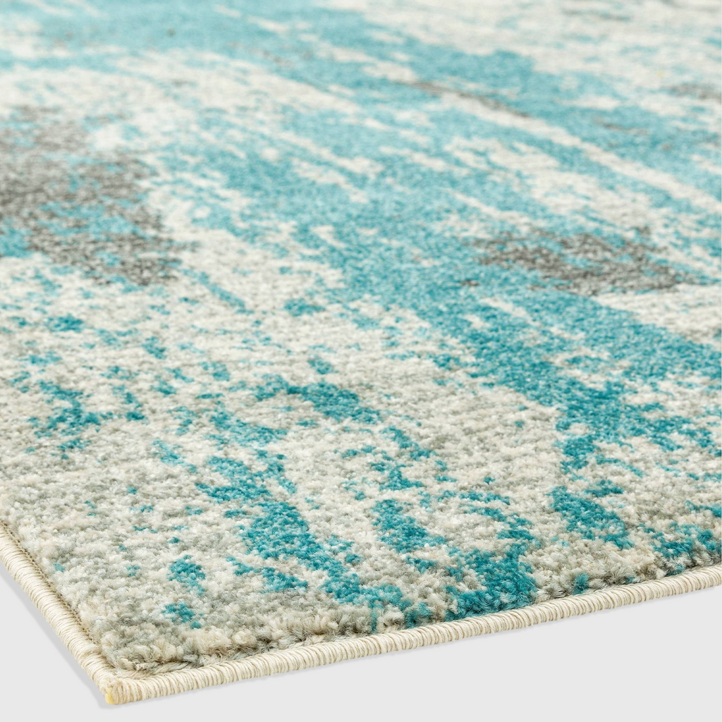 Alvo Rugs Novella Nv15 painterly abstract rug in duck egg blue and grey with a soft polypropylene cut pile finish.