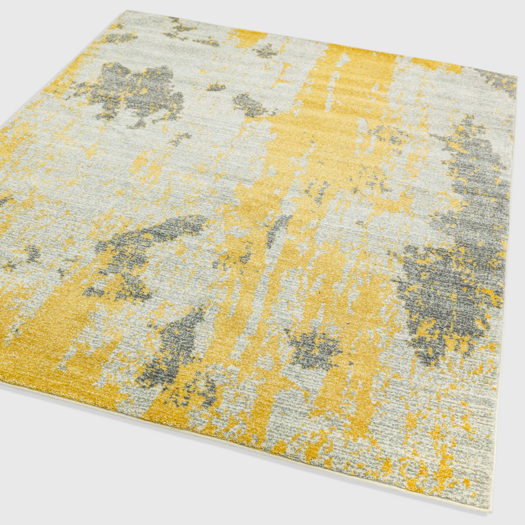 Alvo Rugs Novella Nv18 painterly ochre and grey abstract area rug with a soft polypropylene cut pile finish.