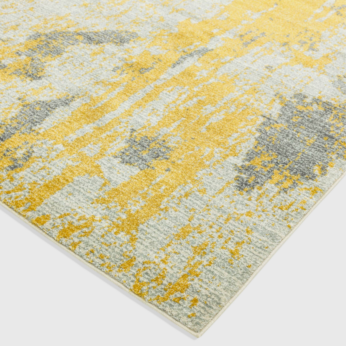 Alvo Rugs Novella Nv18 painterly ochre and grey abstract area rug with a soft polypropylene cut pile texture.