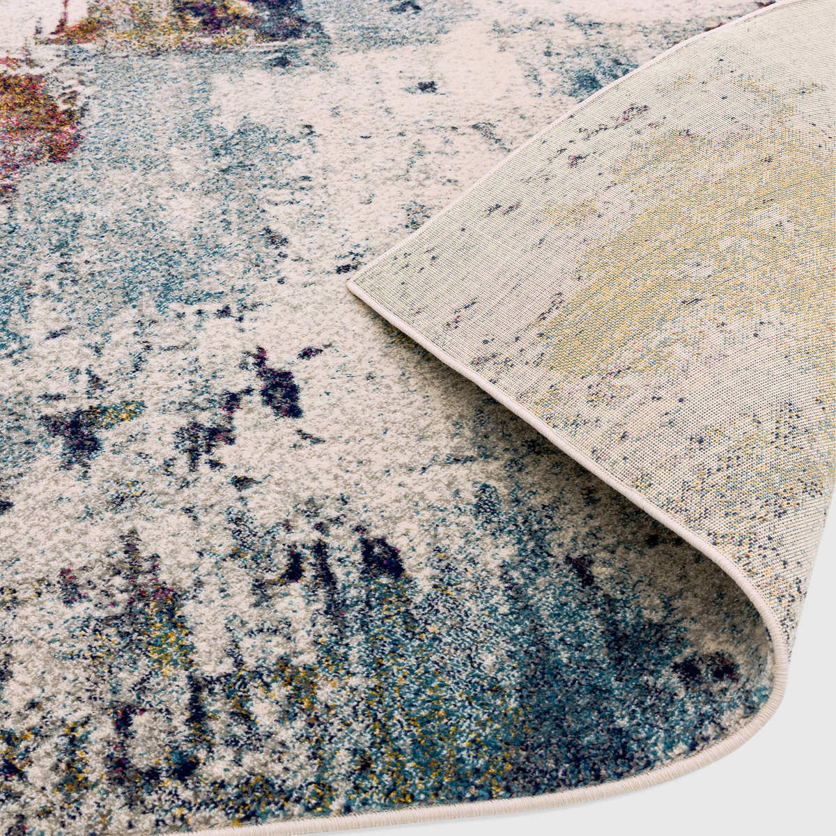Alvo Rugs Novella mustard multi abstract polypropylene rug showing the soft pile and durable jute backing detail.