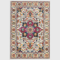 Alvo Rugs Novella Nv24 Persian style area rug with a cream white base and vibrant multi-colored floral medallion