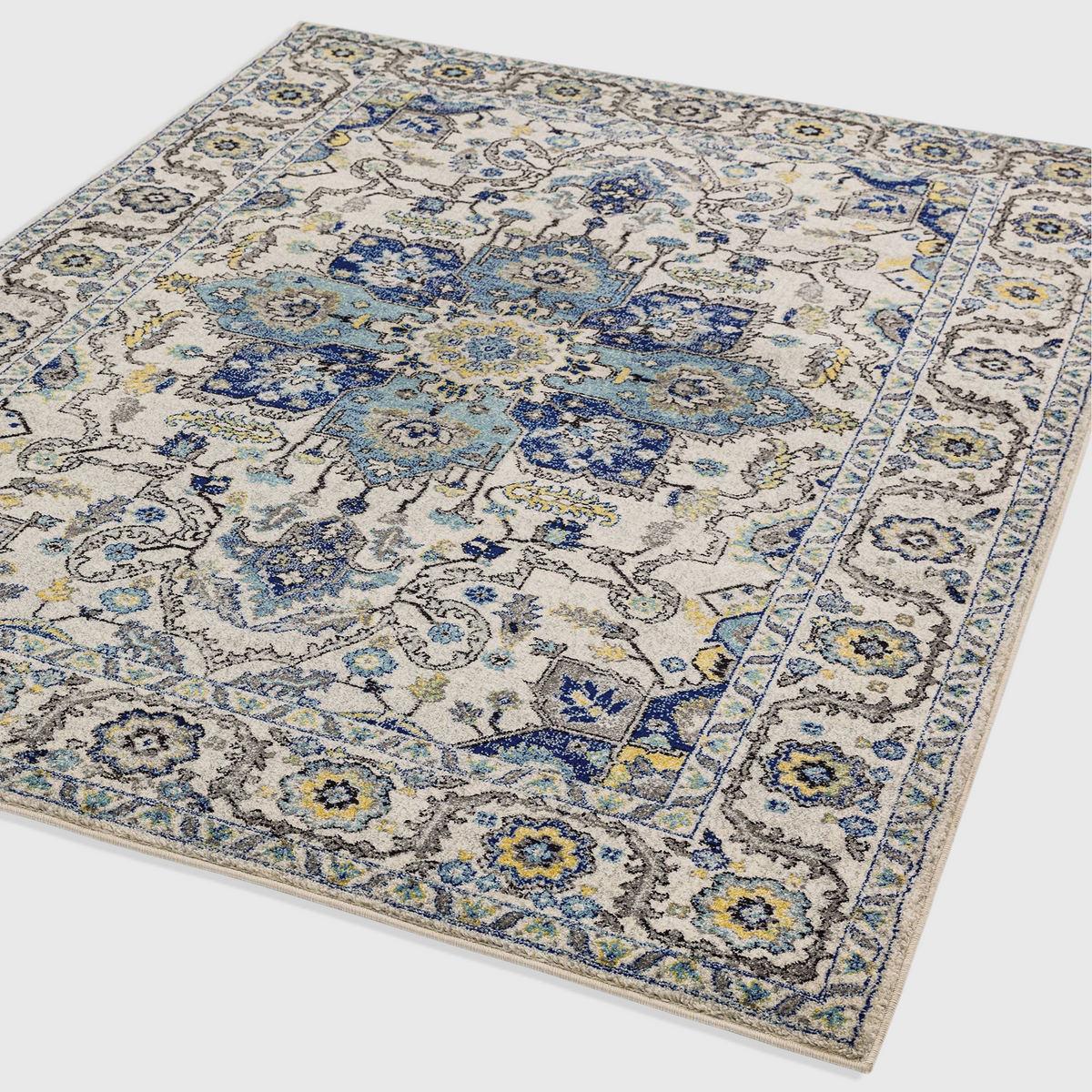 Alvo Rugs Novella Nv25 Persian blue area rug with intricate floral patterns and a soft polypropylene cut pile finish.