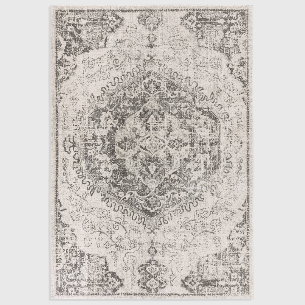 Alvo Rugs Novella Nv26 medallion ivory rug with a classic distressed pattern in cream and grey polypropylene pile.