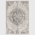 Alvo Rugs Novella Nv26 medallion ivory rug with a classic distressed pattern in cream and grey polypropylene pile.