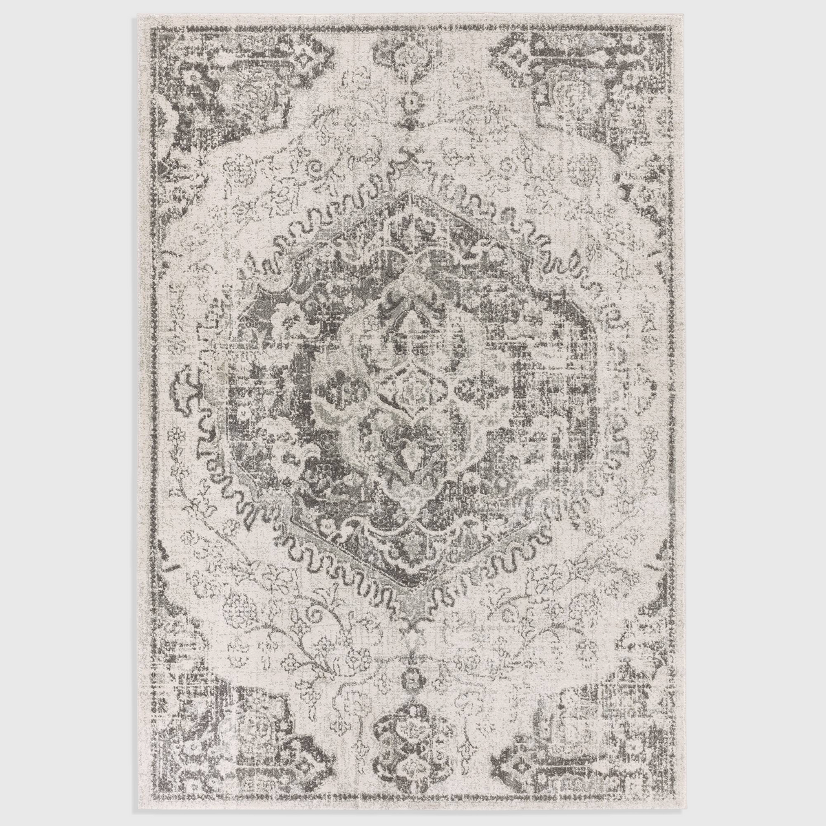 Alvo Rugs Novella Nv26 medallion ivory rug with a classic distressed pattern in cream and grey polypropylene pile.