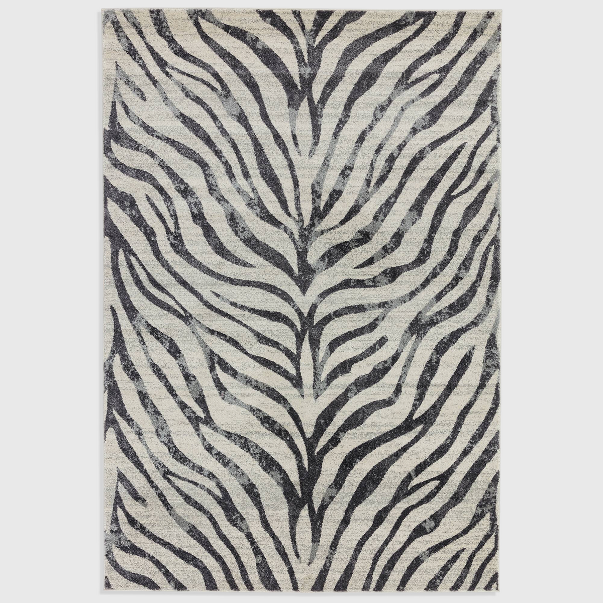 Alvo Rugs Novella Nv27 zebra print area rug in grey and silver tones with a soft, durable polypropylene cut pile.