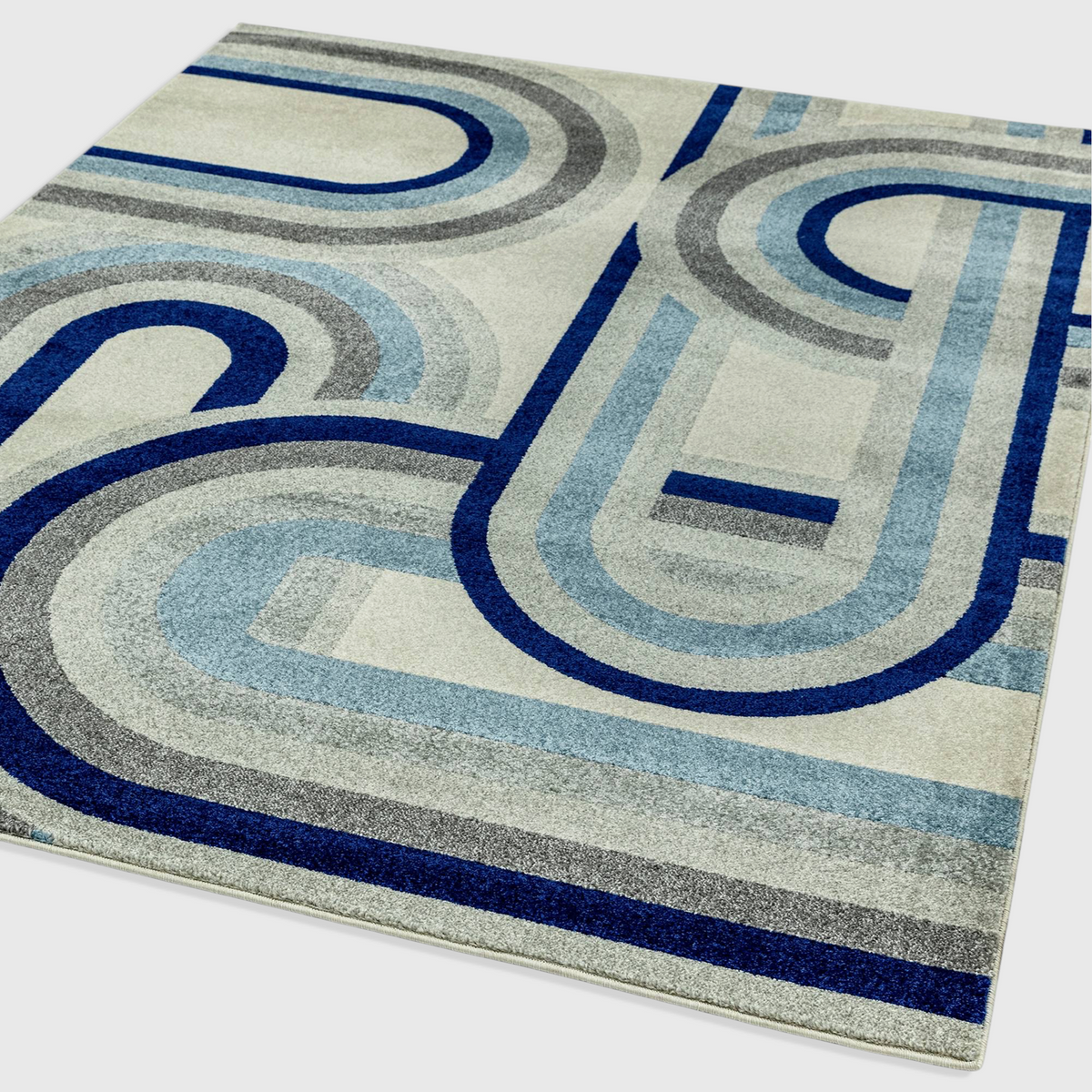 Alvo Rugs Novella Retro Blue Nv30 rug featuring a modern geometric pattern in shades of blue, grey, and cream.