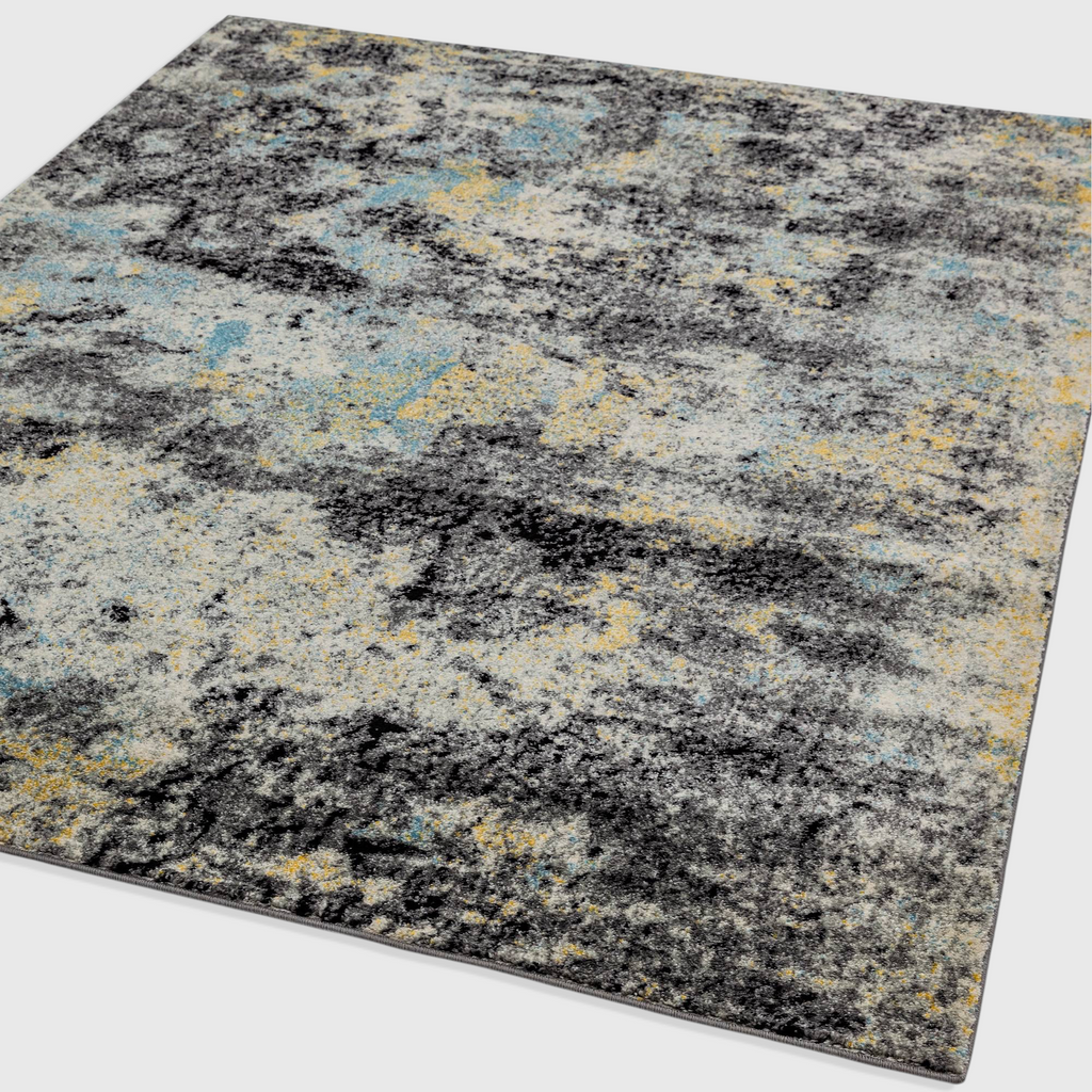 Alvo Rugs Novella Nv32 abstract area rug featuring a vibrant blend of blue, grey, and yellow tones in polypropylene.