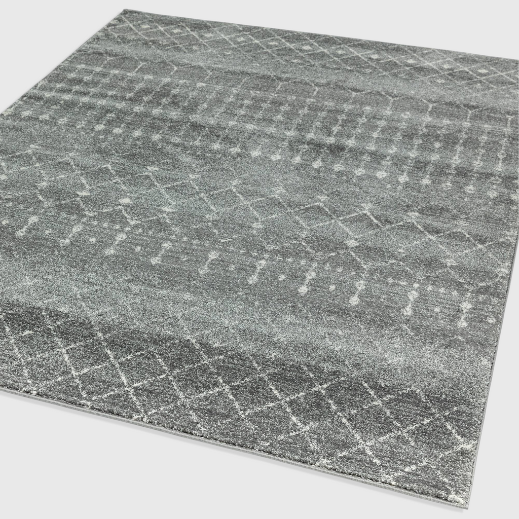 Alvo Rugs Novella dark grey Moroccan style area rug with a soft polypropylene cut pile and geometric pattern.