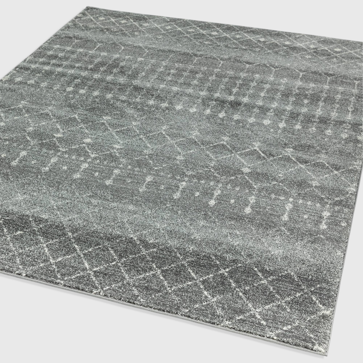 Alvo Rugs Novella dark grey Moroccan style area rug with a soft polypropylene cut pile and geometric pattern.