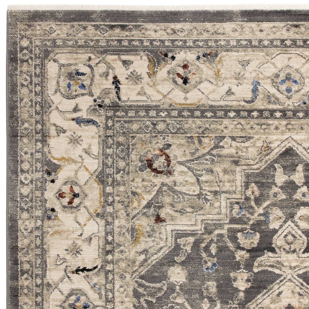 Alvo Rugs Sovra charcoal medallion rug featuring a distressed Persian-inspired pattern in grey and silver tones.