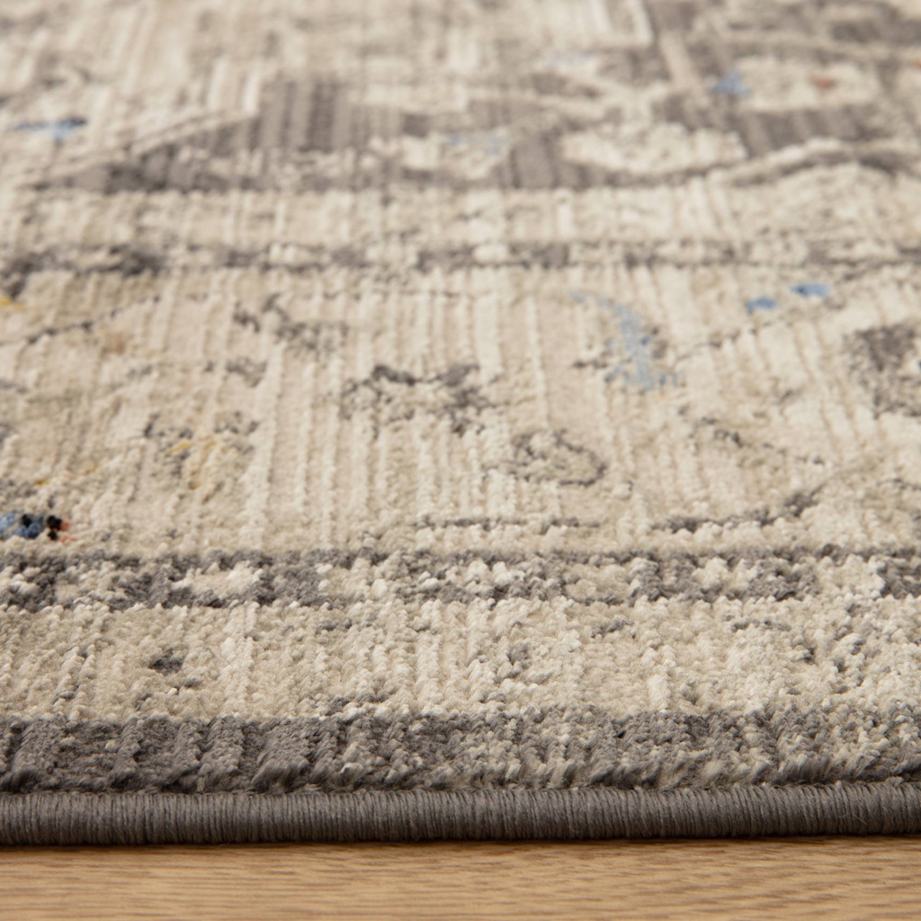 Alvo Rugs Sovra charcoal medallion rug with a distressed grey and silver Persian-inspired pattern in soft polyester.