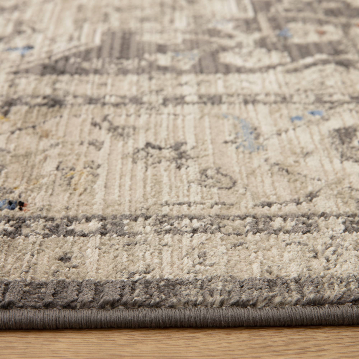 Alvo Rugs Sovra charcoal medallion rug with a distressed grey and silver Persian-inspired pattern in soft polyester.