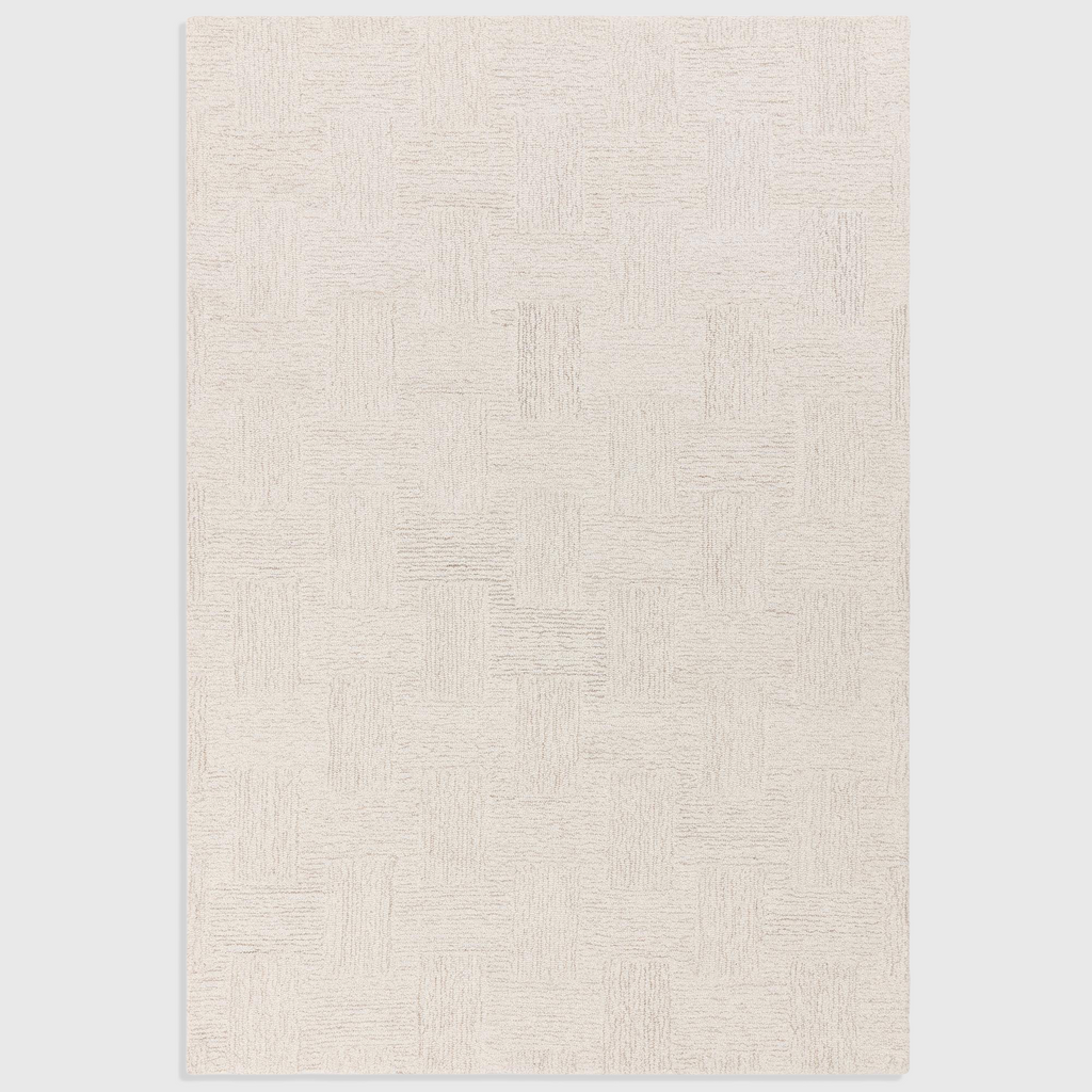 Alvo Rugs Theo Hatch white and sand hand-tufted wool rug with a textured chevron and cross-hatch loop pile pattern.