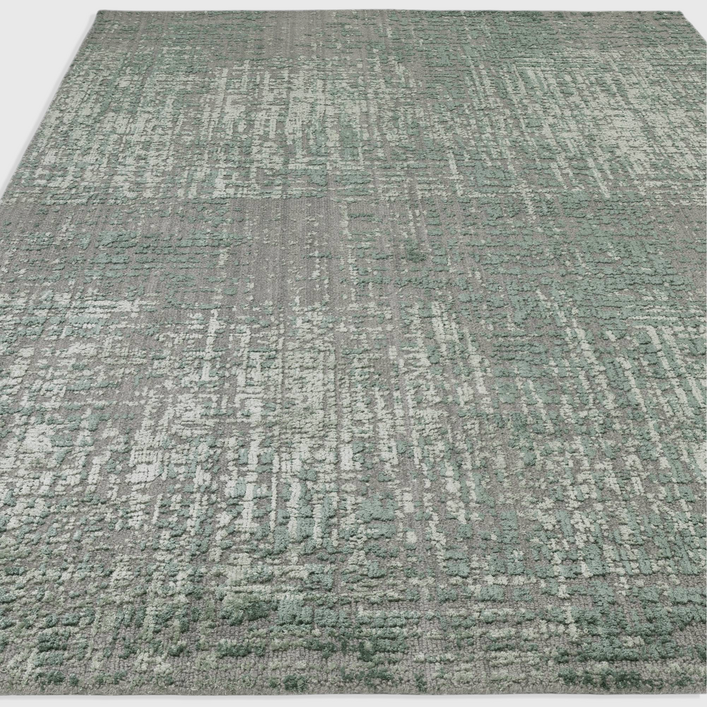 Alvo Rugs Torina forest green abstract area rug with a textured high-low wool and viscose cut and loop pile finish.
