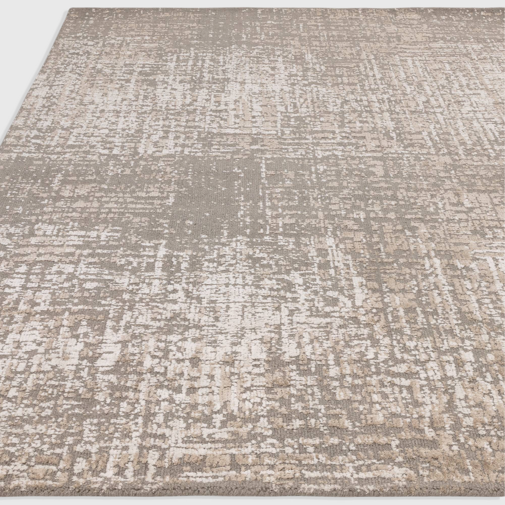Alvo Rugs Torina natural rug featuring an abstract textural design in beige and grey wool and viscose cut pile.