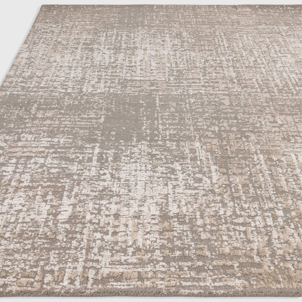 Alvo Rugs Torina natural rug featuring an abstract textural design in beige and grey wool and viscose cut pile.