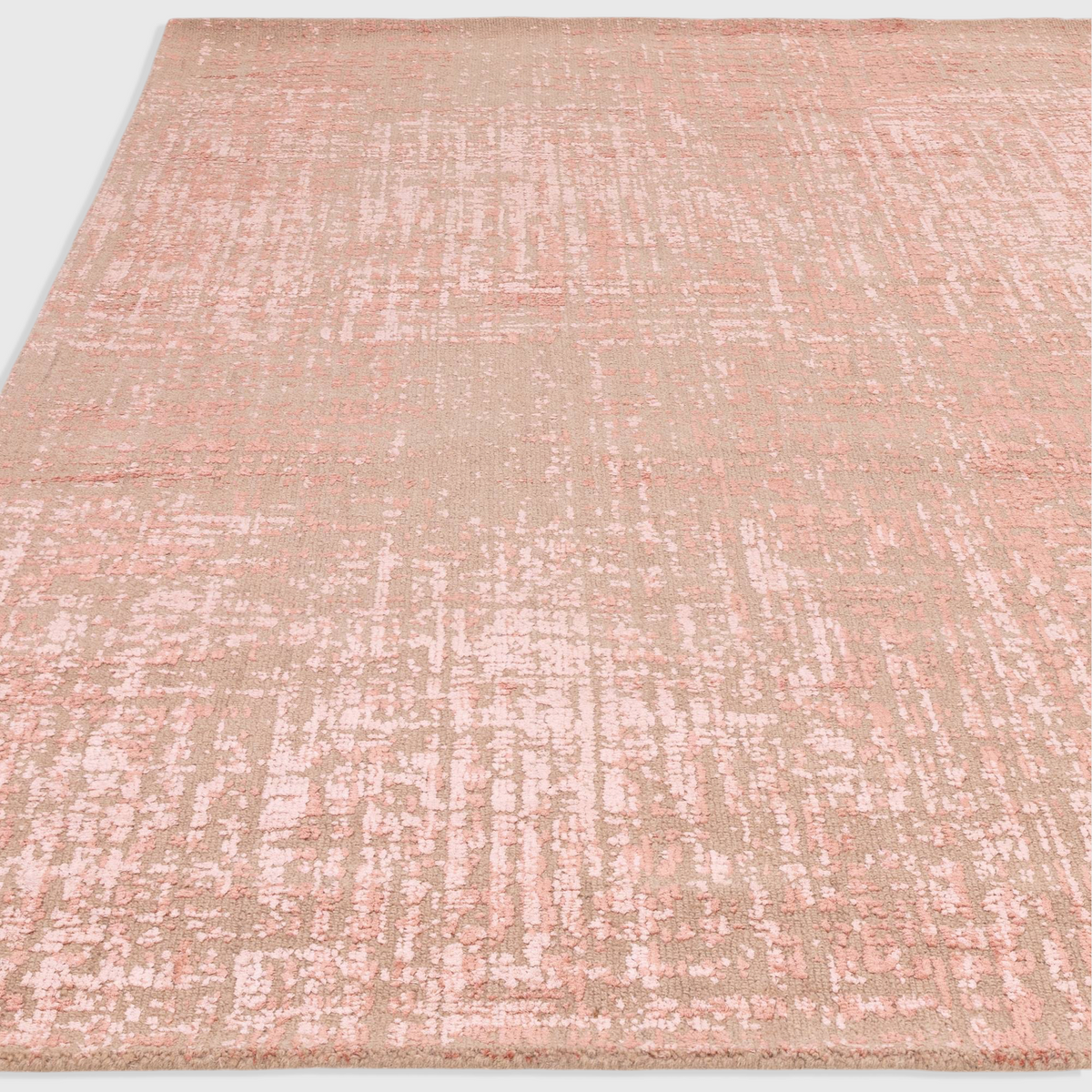 Alvo Rugs Torina terracotta rug with abstract textural pattern in wool and viscose with a high-low cut and loop pile.